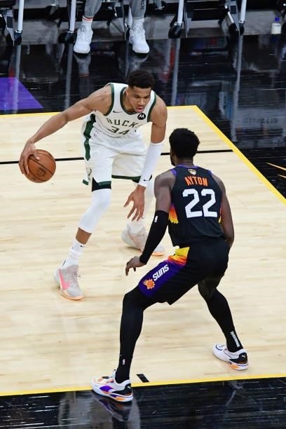 Deandre Ayton of the Phoenix Suns plays defense on Giannis Antetokounmpo of the Milwaukee Bucks during Game One of the 2021 NBA Finals on July 6,...