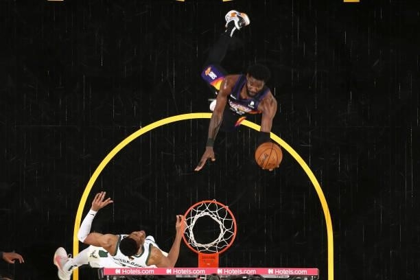 Deandre Ayton of the Phoenix Suns drives to the basket against the Milwaukee Bucks during Game One of the 2021 NBA Finals on July 6, 2021 at Talking...