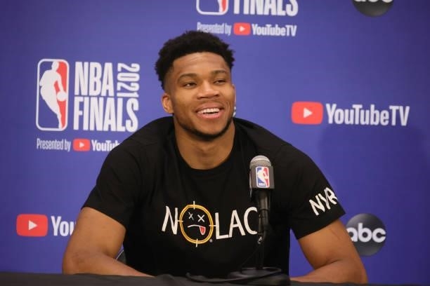 Giannis Antetokounmpo of the Milwaukee Bucks talks to the media after the game against the Phoenix Suns during Game One of the 2021 NBA Finals on...