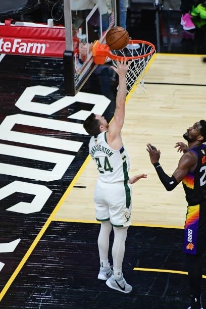 Pat Connaughton of the Milwaukee Bucks shoots the ball against the Phoenix Suns during Game One of the 2021 NBA Finals on July 6, 2021 at Phoenix...
