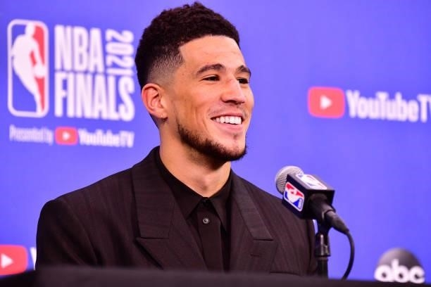 Devin Booker of the Phoenix Suns talks to the media after the game against the Milwaukee Bucks during Game One of the 2021 NBA Finals on July 6, 2021...
