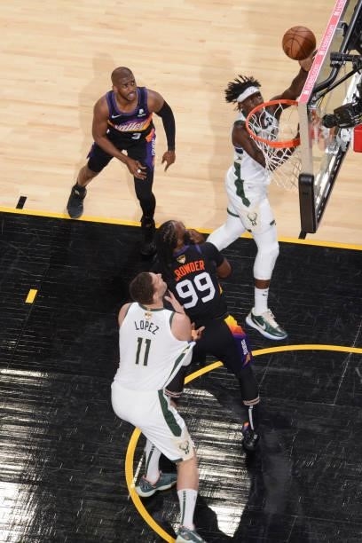 Jrue Holiday of the Milwaukee Bucks drives to the basket against the Phoenix Suns during Game One of the 2021 NBA Finals on July 6, 2021 at Phoenix...