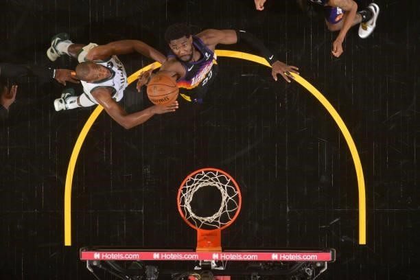 Deandre Ayton of the Phoenix Suns rebounds the ball against the Milwaukee Bucks during Game One of the 2021 NBA Finals on July 6, 2021 at Phoenix...