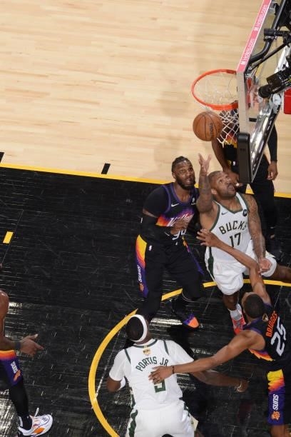 Tucker of the Milwaukee Bucks drives to the basket against the Phoenix Suns during Game One of the 2021 NBA Finals on July 6, 2021 at Phoenix Suns...