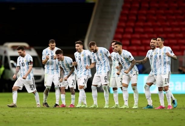 Lionel Messi of Argentina celebrate with teammates winning a Penalty Shootout ,after the Semifinal match between Argentina and Colombia as part of...