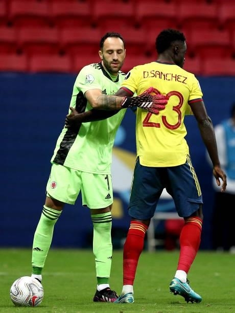 Davinson Sanchez reacts with goalkeeper David Ospina of Colombia after missing his penalty during a penalty shootout in the Conmebol Copa America...
