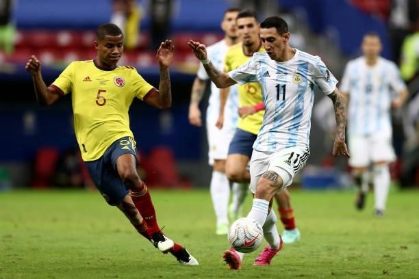 Angel Di Maria of Argentina competes for the ball with Wilmar Barrios of Colombia ,during the Semifinal match between Argentina and Colombia as part...