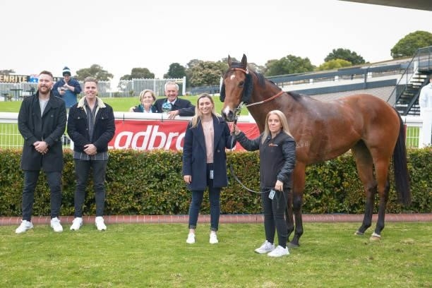 Connections of Sessions Road after winning the @2unitspodcast Handicap, at Ladbrokes Park Hillside Racecourse on July 07, 2021 in Springvale,...
