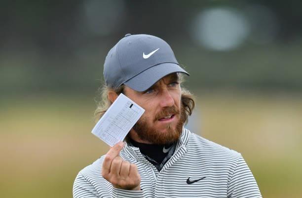 Tommy Fleetwood of England finishes his round at the 18th hole during a practice day prior to the abrdn Scottish Open at The Renaissance Club on July...