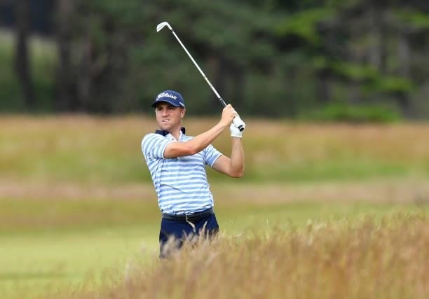 Justin Thomas of United States plays his second shot to the 18th hole during a practice day prior to the abrdn Scottish Open at The Renaissance Club...