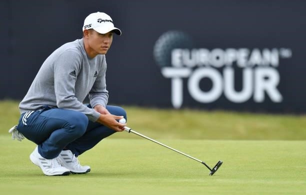 Collin Morikawa of United States at the 18th green during a practice day prior to the abrdn Scottish Open at The Renaissance Club on July 7, 2021 in...