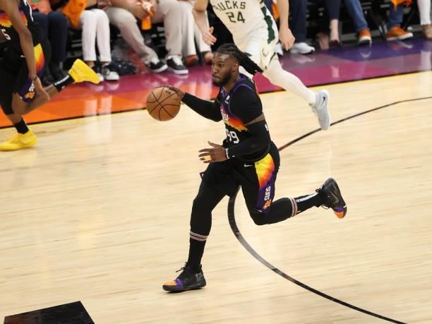 Jae Crowder of the Phoenix Suns dribbles the ball during Game One of the 2021 NBA Finals on July 6, 2021 at Phoenix Suns Arena in Phoenix, Arizona....