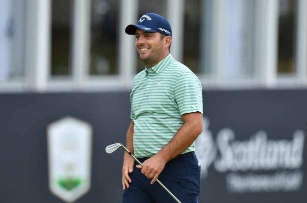 Francesco Molinari of Italy finishes his round at the 18th hole during a practice day prior to the abrdn Scottish Open at The Renaissance Club on...