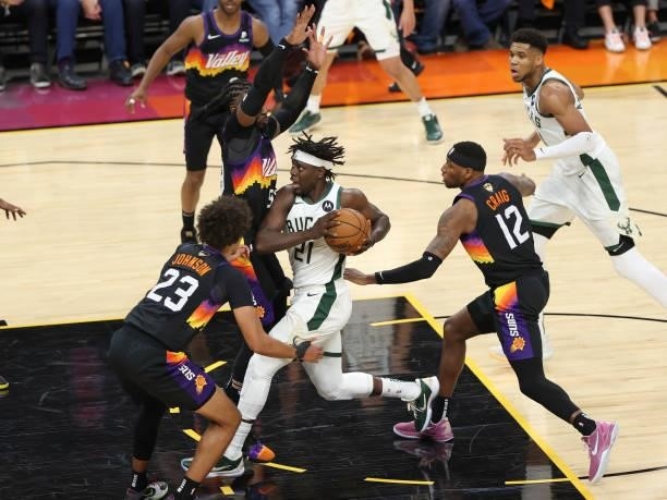 Jrue Holiday of the Milwaukee Bucks drives to the basket during Game One of the 2021 NBA Finals on July 6, 2021 at Phoenix Suns Arena in Phoenix,...