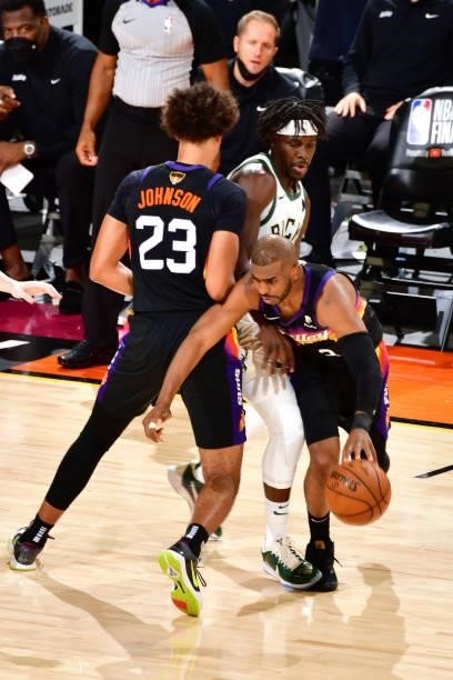 Chris Paul of the Phoenix Suns dribbles the ball during Game One of the 2021 NBA Finals on July 6, 2021 at Phoenix Suns Arena in Phoenix, Arizona....