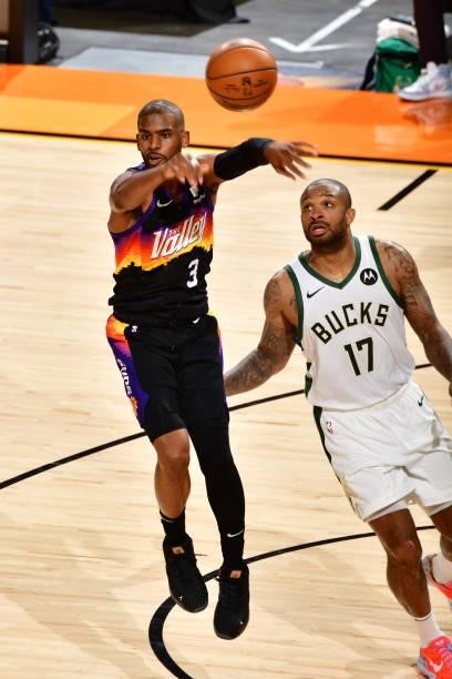 Chris Paul of the Phoenix Suns passes the ball during Game One of the 2021 NBA Finals on July 6, 2021 at Phoenix Suns Arena in Phoenix, Arizona. NOTE...