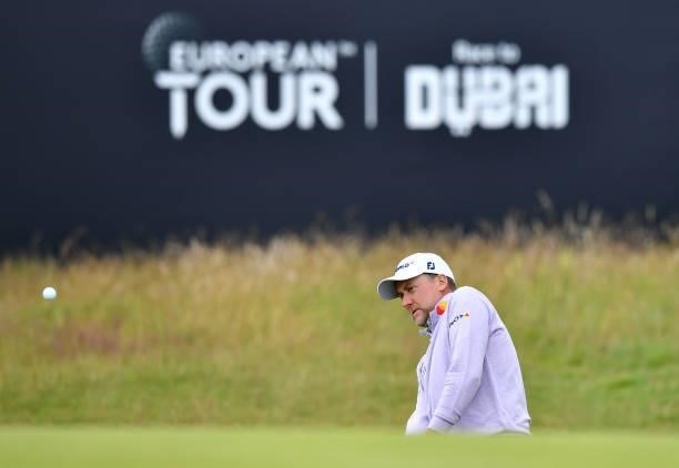 Ian Poulter of England plays his third shot to the 18th hole during a practice day prior to the abrdn Scottish Open at The Renaissance Club on July...