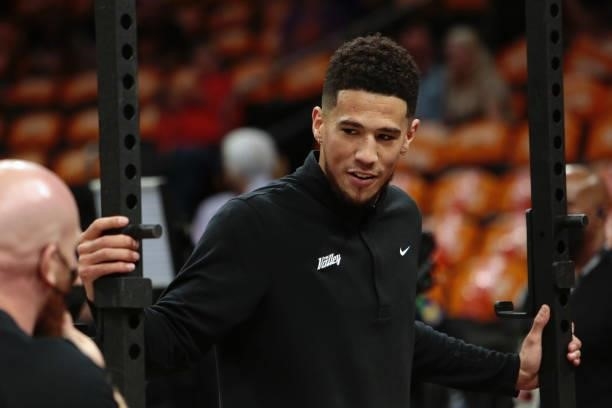 Devin Booker of the Phoenix Suns warms up for the game against Milwaukee Bucks during Game One of the 2021 NBA Finals on July 6, 2021 at Phoenix Suns...