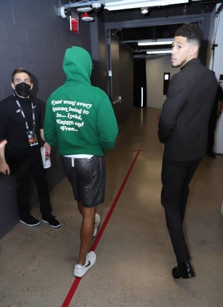 Chris Paul and Devin Booker of the Phoenix Suns postgame against Milwaukee Bucks during Game One of the 2021 NBA Finals on July 6, 2021 at Phoenix...