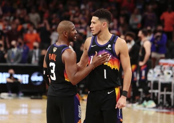 Chris Paul and Devin Booker of the Phoenix Suns against Milwaukee Bucks during Game One of the 2021 NBA Finals on July 6, 2021 at Phoenix Suns Arena...
