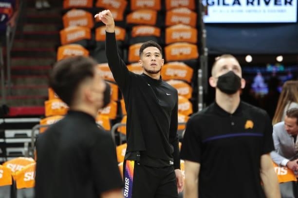 Devin Booker of the Phoenix Suns warms up against Milwaukee Bucks during Game One of the 2021 NBA Finals on July 6, 2021 at Phoenix Suns Arena in...