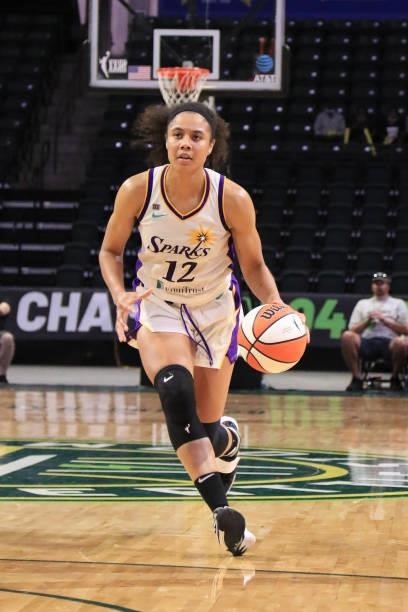 Nia Coffey of the Los Angeles Sparks handles the ball against the Seattle Storm on July 7, 2021 at the Angel of the Winds Arena, in Everett,...