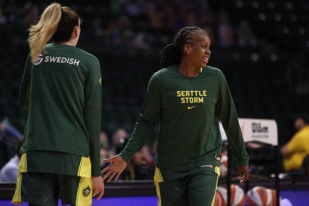 Epiphanny Prince of the Seattle Storm high fives her teammate before the game against the Los Angeles Sparks on July 7, 2021 at the Angel of the...