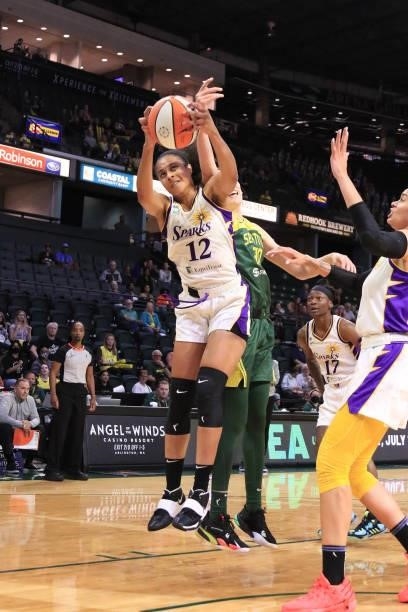 Nia Coffey of the Los Angeles Sparks grabs the rebound against the Seattle Storm on July 7, 2021 at the Angel of the Winds Arena, in Everett,...