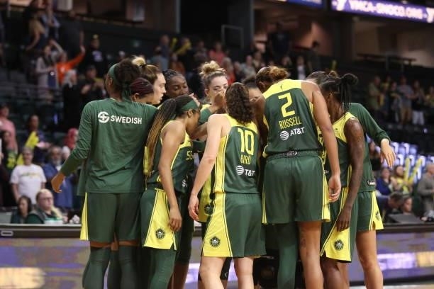 The Seattle Storm huddle up during the game against the Los Angeles Sparks on July 7, 2021 at the Angel of the Winds Arena, in Everett, Washington....