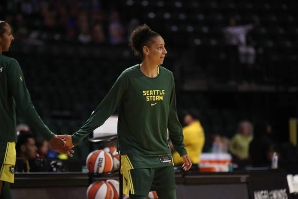 Candice Dupree of the Seattle Storm high fives her teammate before the game against the Los Angeles Sparks on July 7, 2021 at the Angel of the Winds...