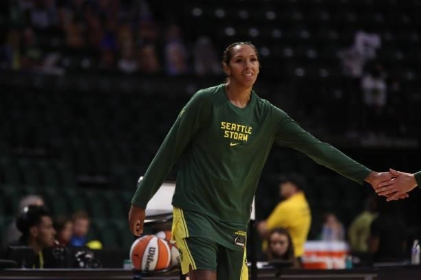 Mercedes Russell of the Seattle Storm high fives her teammate before the game against the Los Angeles Sparks on July 7, 2021 at the Angel of the...