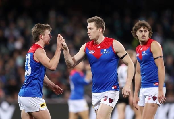 Tom McDonald of the Demons celebrates a goal with James Jordon during the 2021 AFL Round 17 match between the Port Adelaide Power and the Melbourne...