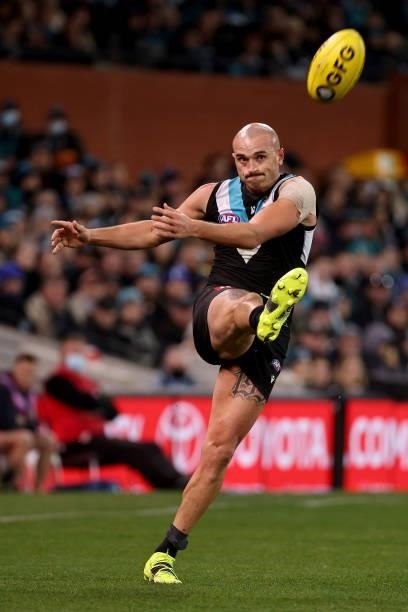 Sam Powell-Pepper of the Power kicks the ball during the 2021 AFL Round 17 match between the Port Adelaide Power and the Melbourne Demons at Adelaide...