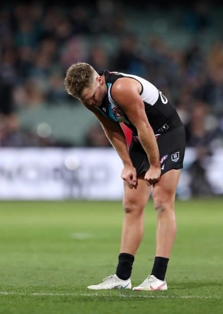 Dan Houston of the Power puts his hands on his knees after the loss during the 2021 AFL Round 17 match between the Port Adelaide Power and the...