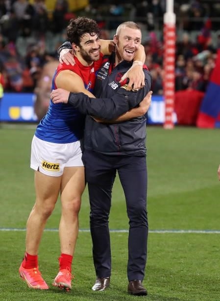 Christian Petracca of the Demons hugs coach Simon Goodwin after the win during the 2021 AFL Round 17 match between the Port Adelaide Power and the...