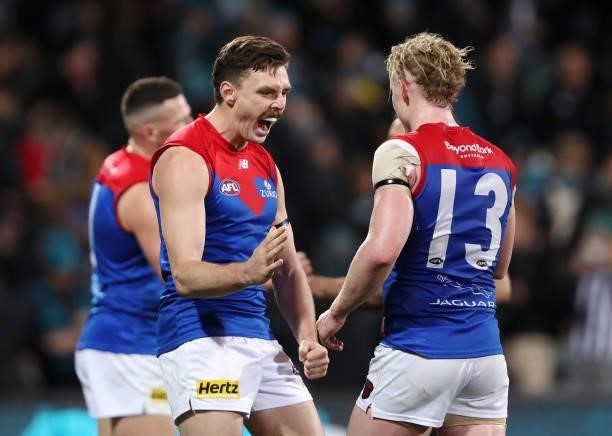 Jake Lever of the Demons celebrates the win with Clayton Oliver during the 2021 AFL Round 17 match between the Port Adelaide Power and the Melbourne...