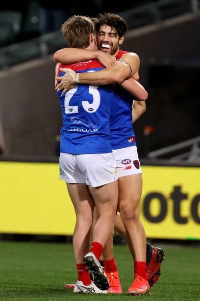James Jordon and Christian Petracca of the Demons celebrate a goal during the 2021 AFL Round 17 match between the Port Adelaide Power and the...