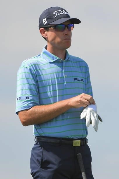 Drew Weaver puts on his glove while standing on the fourth tee box during the first round of the Korn Ferry Tours TPC Colorado Championship at Heron...