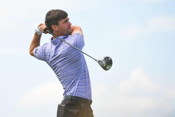 Ollie Schniederjans tees off on the fourth hole during the first round of the Korn Ferry Tours TPC Colorado Championship at Heron Lakes on July 8,...