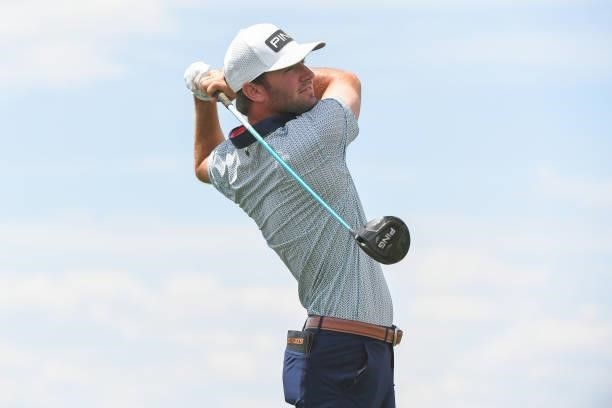 Austin Eckroat tees off on the fourth hole during the first round of the Korn Ferry Tours TPC Colorado Championship at Heron Lakes on July 8, 2021 in...
