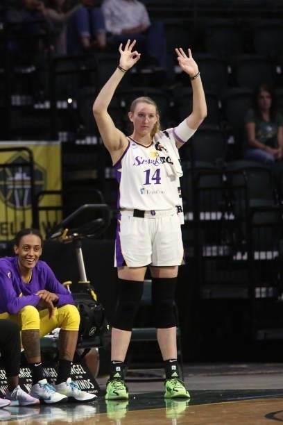 Lauren Cox of the Los Angeles Sparks celebrates during the game against the Seattle Storm on July 7, 2021 at the Angel of the Winds Arena, in...