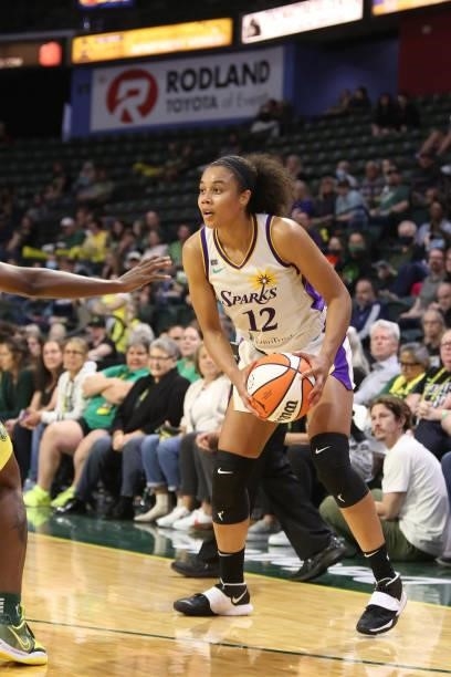 Nia Coffey of the Los Angeles Sparks dribbles the ball during the game against the Seattle Storm on July 7, 2021 at the Angel of the Winds Arena, in...