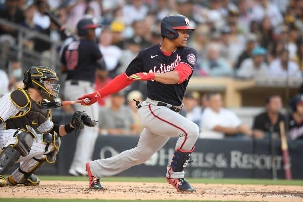 Juan Soto of the Washington Nationals hits a single during the third inning of a baseball game against San Diego Padres at PETCO Park on July 8, 2021...