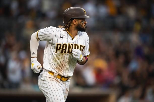 Fernando Tatis Jr of the San Diego Padres hits a home run in the fourth inning against the Washington Nationals on July 8, 2021 at Petco Park in San...