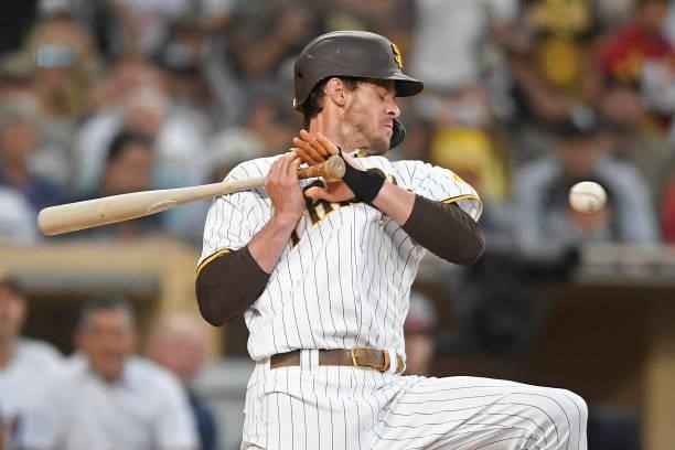 Wil Myers of the San Diego Padres dodges a pitch during the fourth inning of a baseball game against Washington Nationals at PETCO Park on July 8,...
