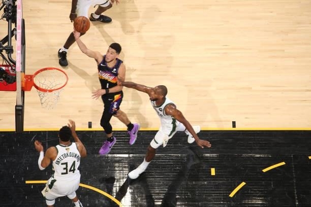 Devin Booker of the Phoenix Suns drives to the basket against the Milwaukee Bucks during Game Two of the 2021 NBA Finals on July 8, 2021 at Phoenix...