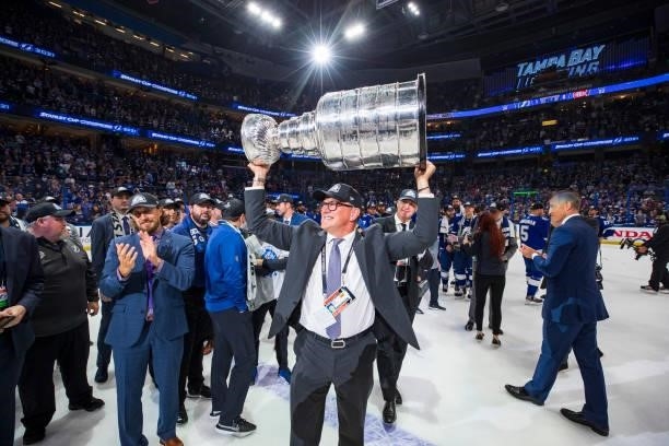Stacy Roest, Director Of Player Development of the Tampa Bay Lightning hoists the Stanley Cup overhead after the Tampa Bay Lightning defeated the...