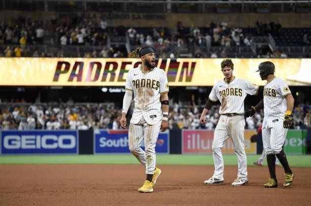San Diego Padres players walk off the field after beating the Washington Nationals 9-8 in a baseball game at Petco Park on July 8, 2021 in San Diego,...
