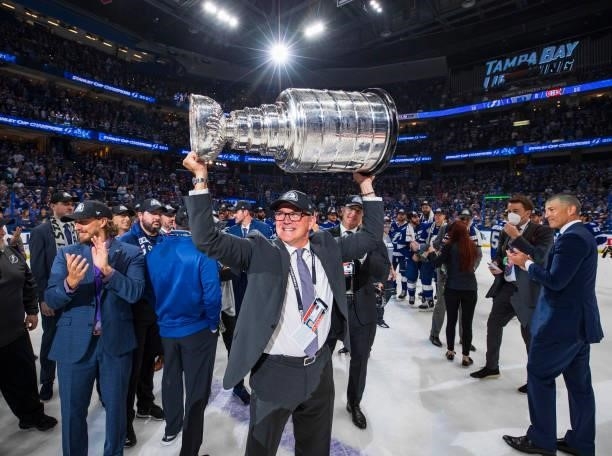Stacy Roest, Director Of Player Development of the Tampa Bay Lightning hoists the Stanley Cup overhead after the Tampa Bay Lightning defeated the...