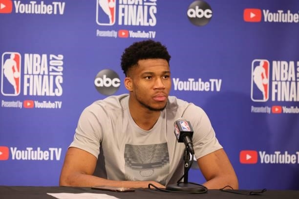 Giannis Antetokounmpo of the Milwaukee Bucks talks with the media after the game against the Phoenix Suns during Game Two of the 2021 NBA Finals on...
